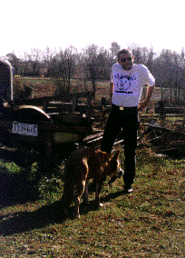 man with squealer tee shirt on